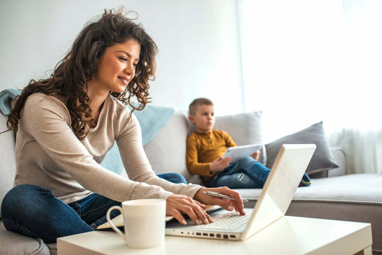 stock-photo-millennial-generation-mother-working-from-home-with-small-children-while-in-quarantine-isolation-1680923359